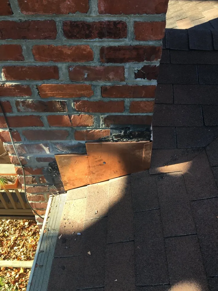 Slide of Norfolk Roofing