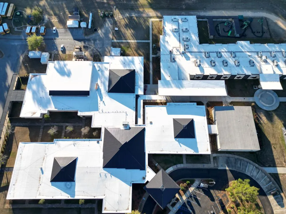 Slide of Norman Roofing