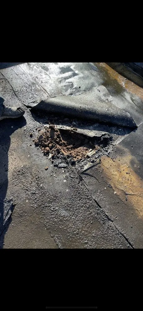 Slide of North East Commercial Roofing