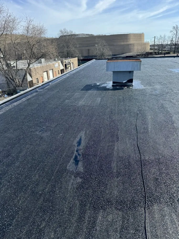 Slide of North East Commercial Roofing