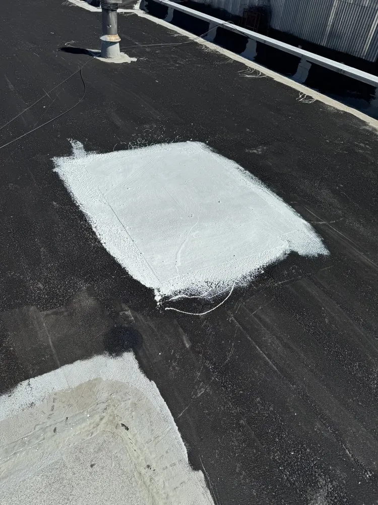 Slide of North East Commercial Roofing