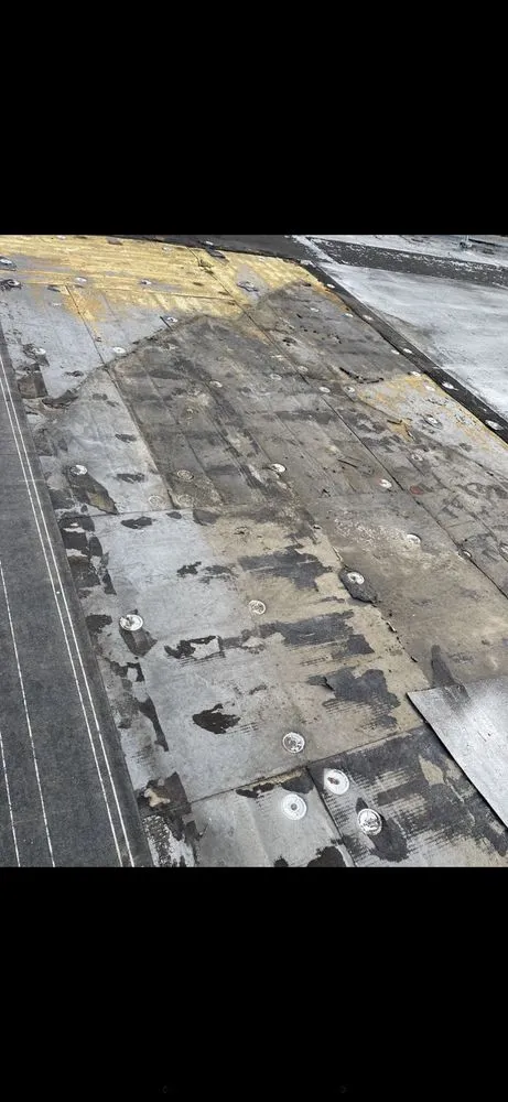 Slide of North East Commercial Roofing