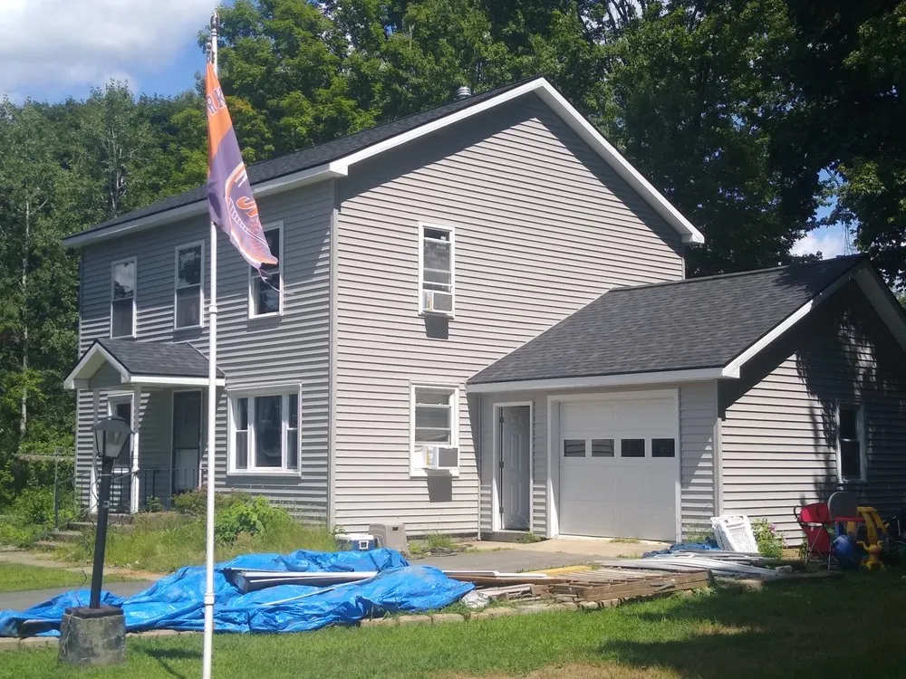 Slide of North-East Complete Roofing Service