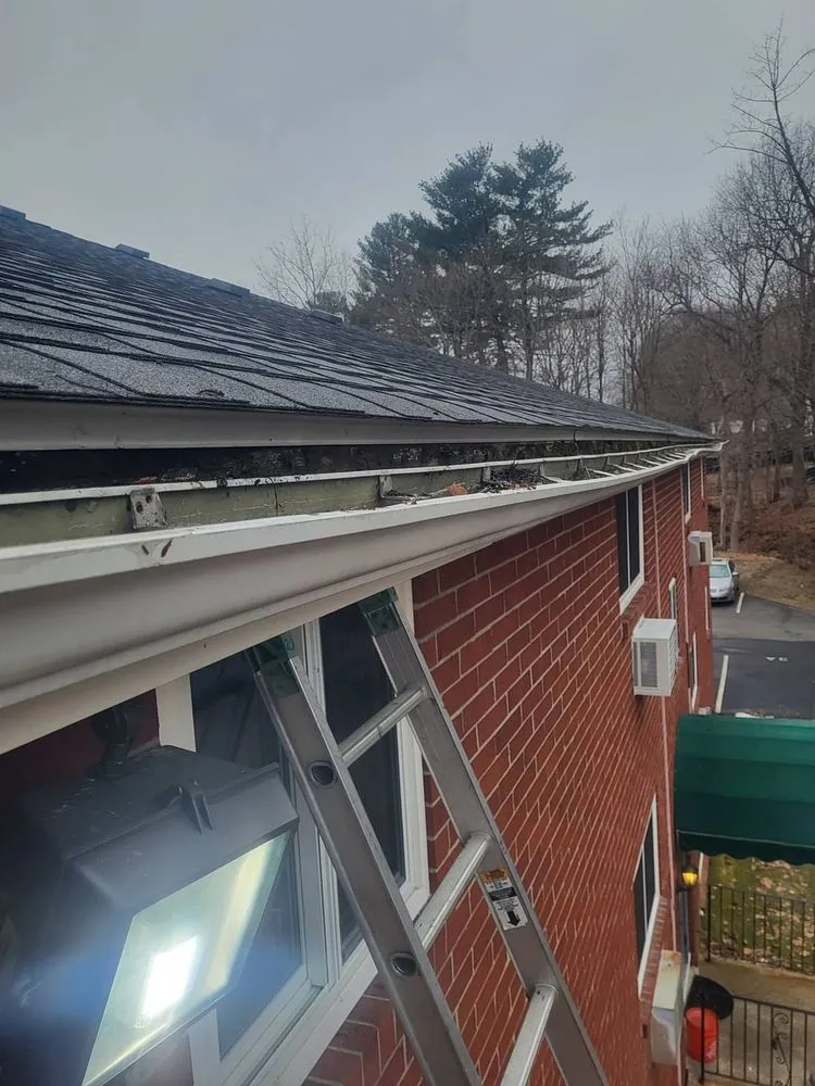 Slide of North East Roof Tune-Ups