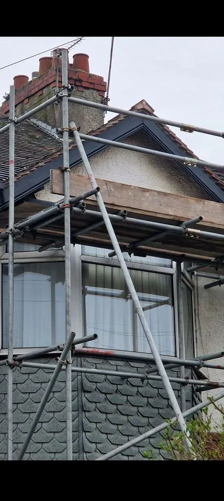 Slide of North Shattuck Roofing