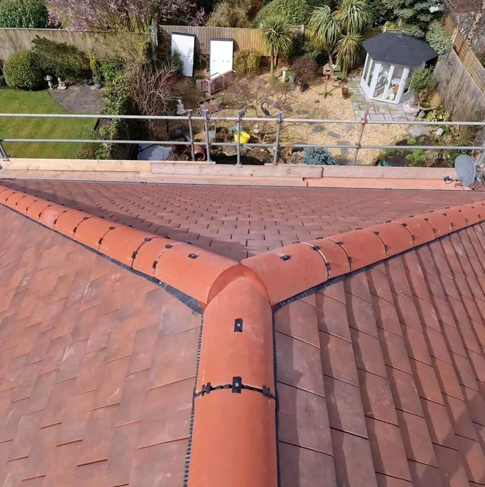 Slide of North Shattuck Roofing