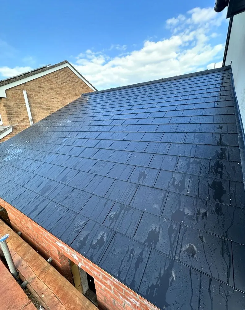 Slide of North Shattuck Roofing