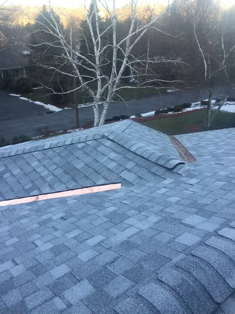 Slide of North Shore Roofing