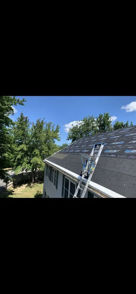 Slide of North Shore Roofing