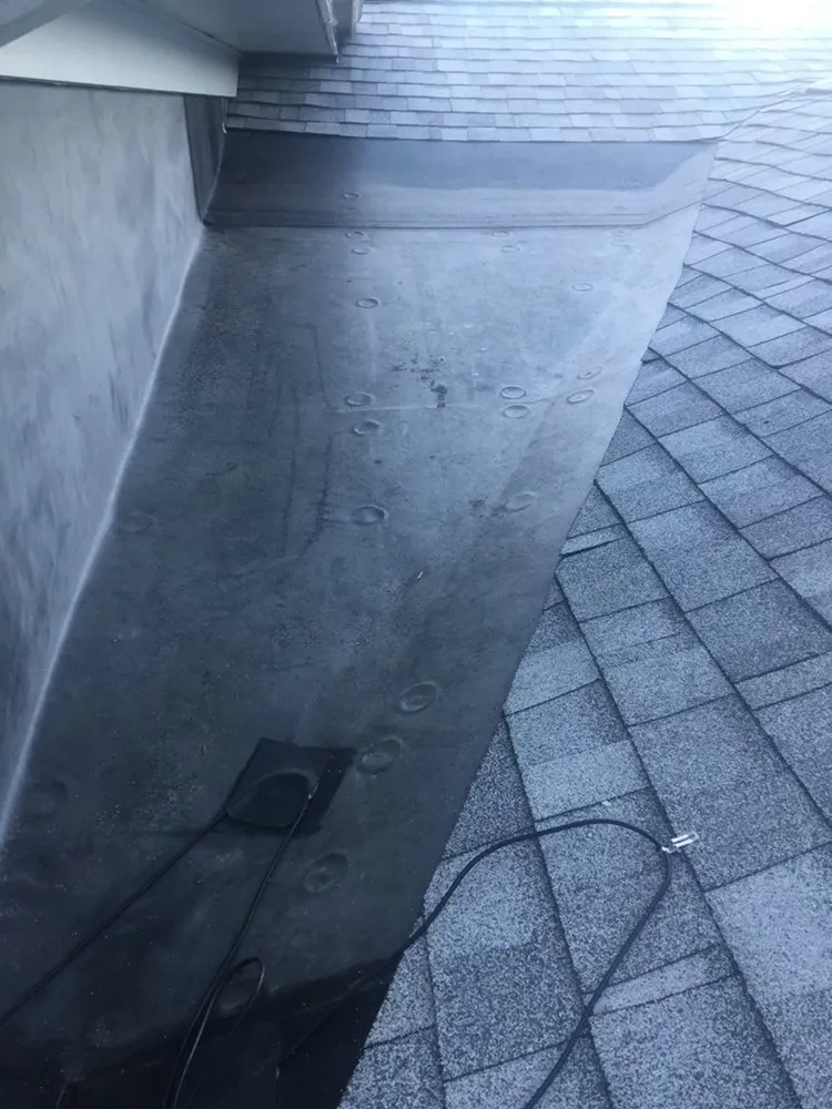 Slide of North Shore Roofing