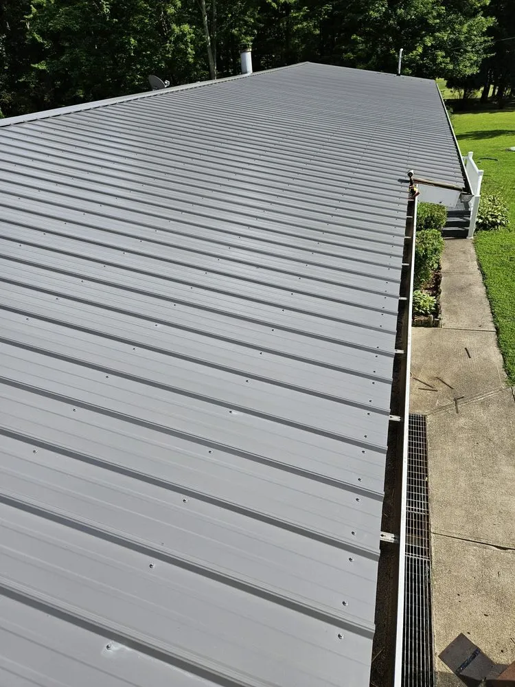 Emergency metal roofing installation after storm damage in Pierpont, OH by Northcoast Construction