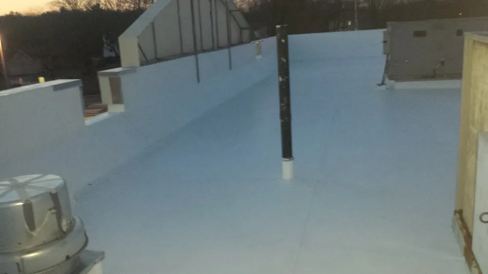 Slide of Northeast Industrial Roof