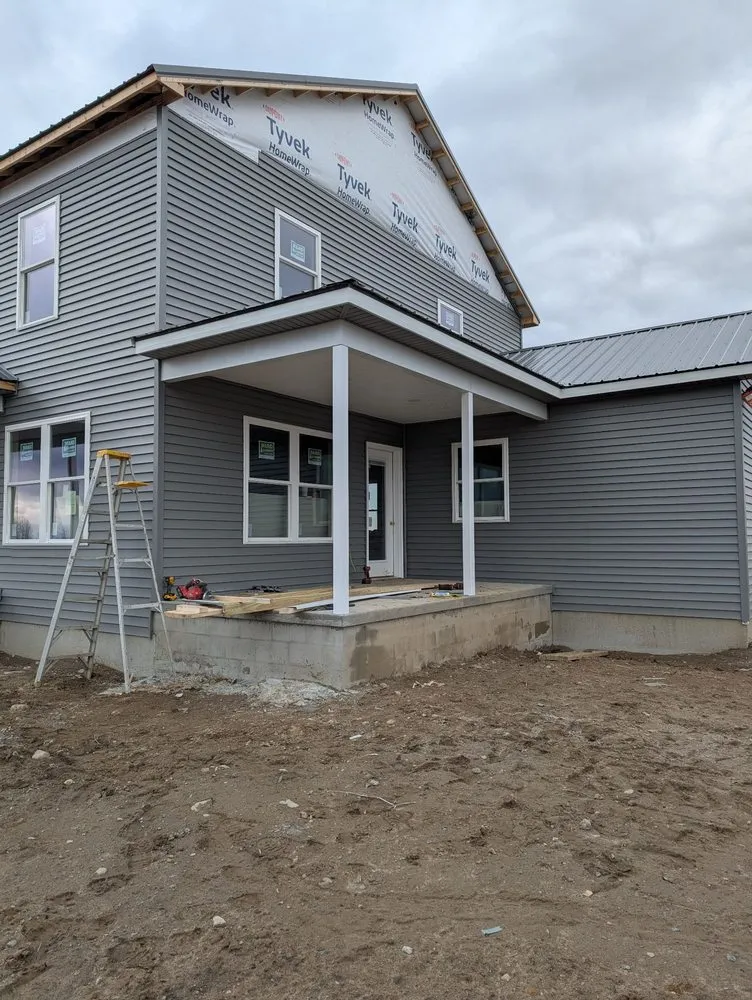Local roof repair in Brushton, NY by Northern Exteriors Roofing and Siding