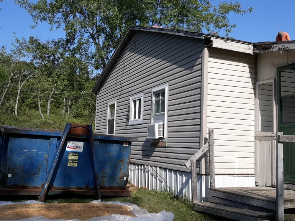 Emergency roof replacement after storm damage in Mesick, MI by Northern Michigan Roofing Connection