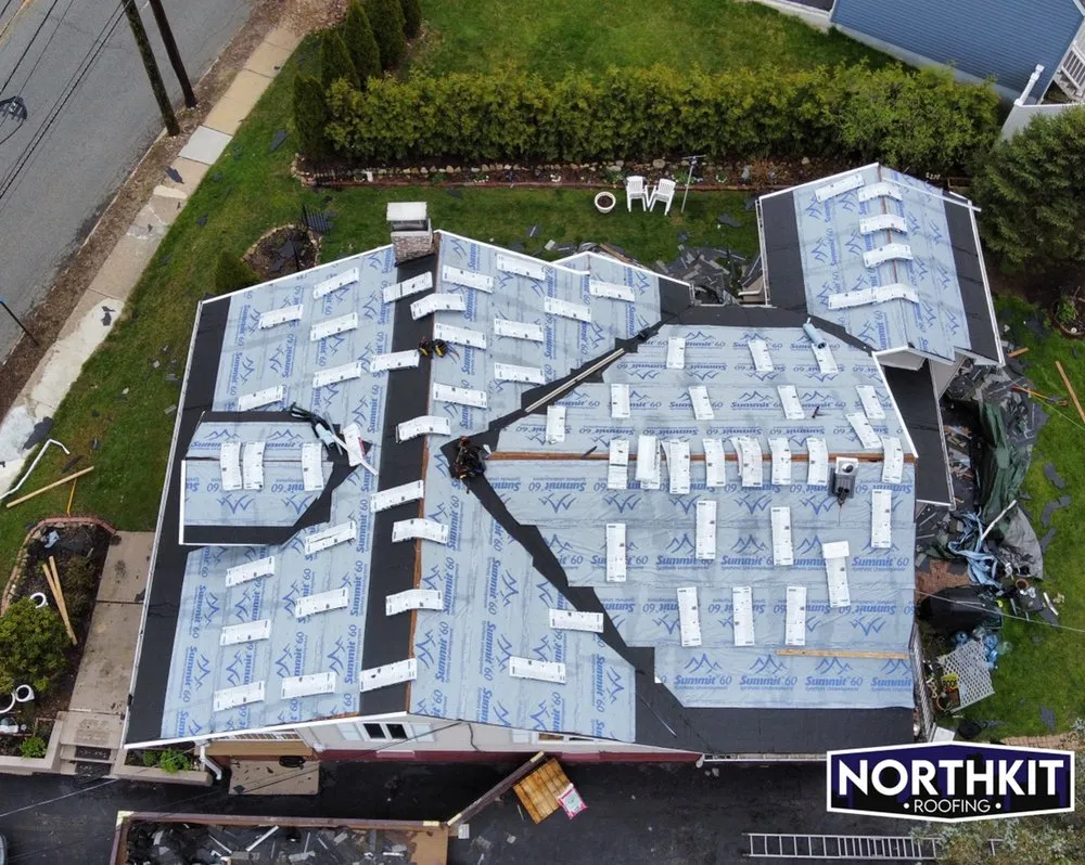 Slide of Northkit Roofing