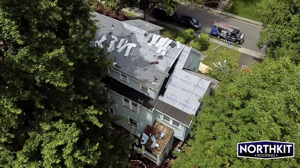 Slide of Northkit Roofing