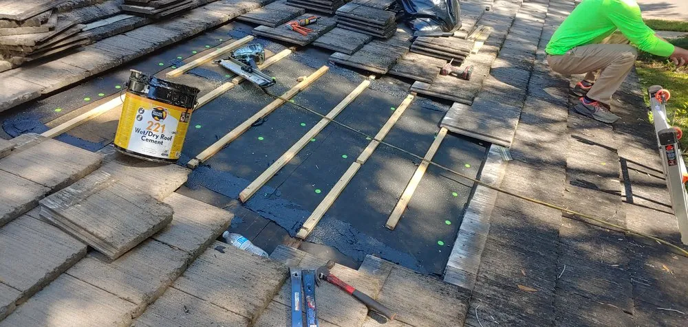 Slide of Northmen Roofing