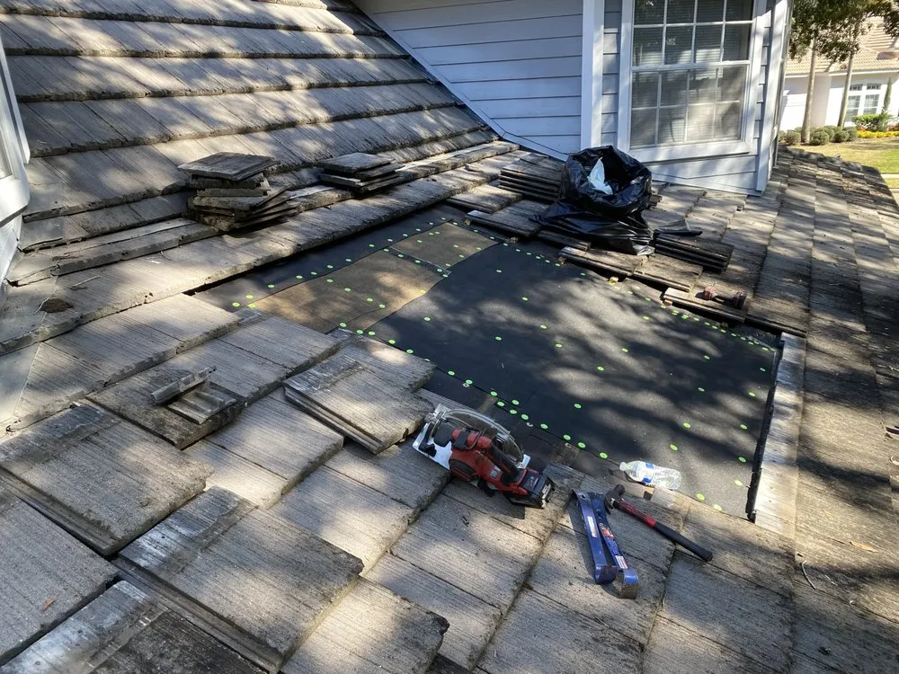 Slide of Northmen Roofing