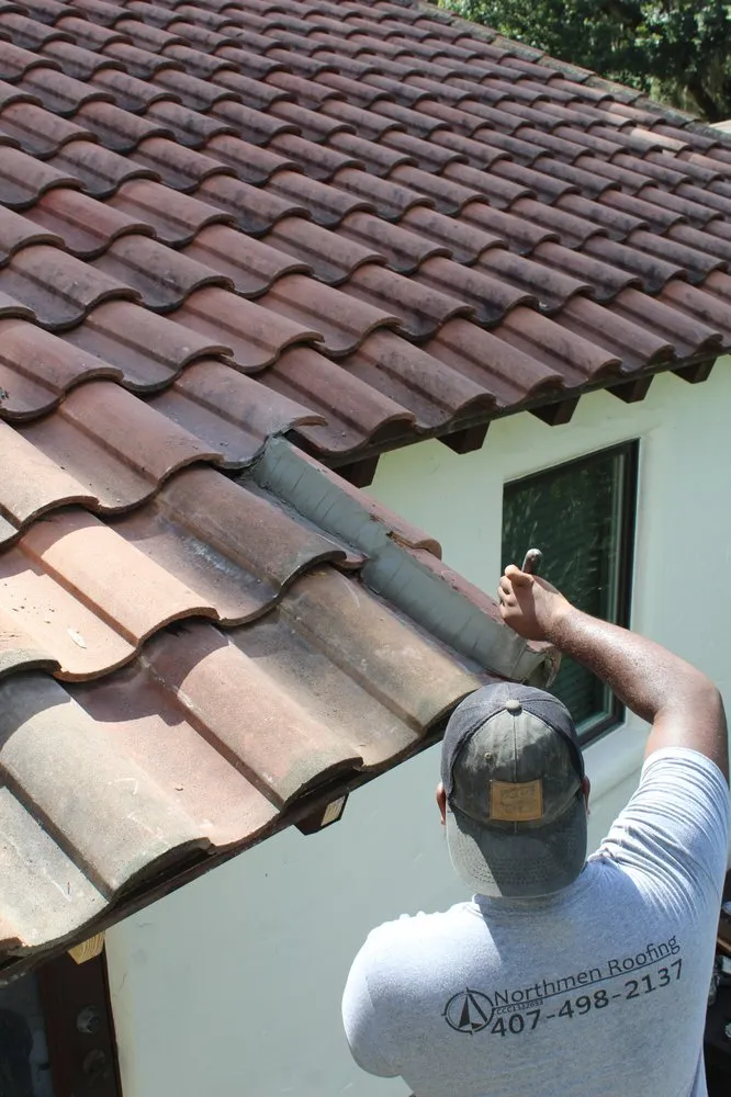 Slide of Northmen Roofing