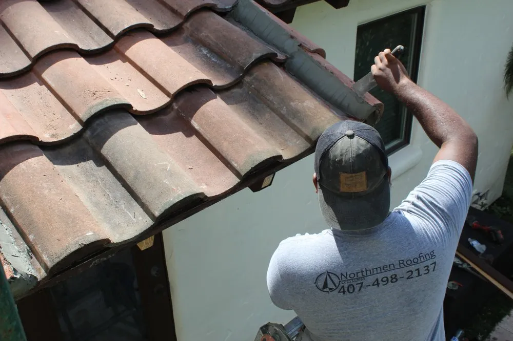 Slide of Northmen Roofing