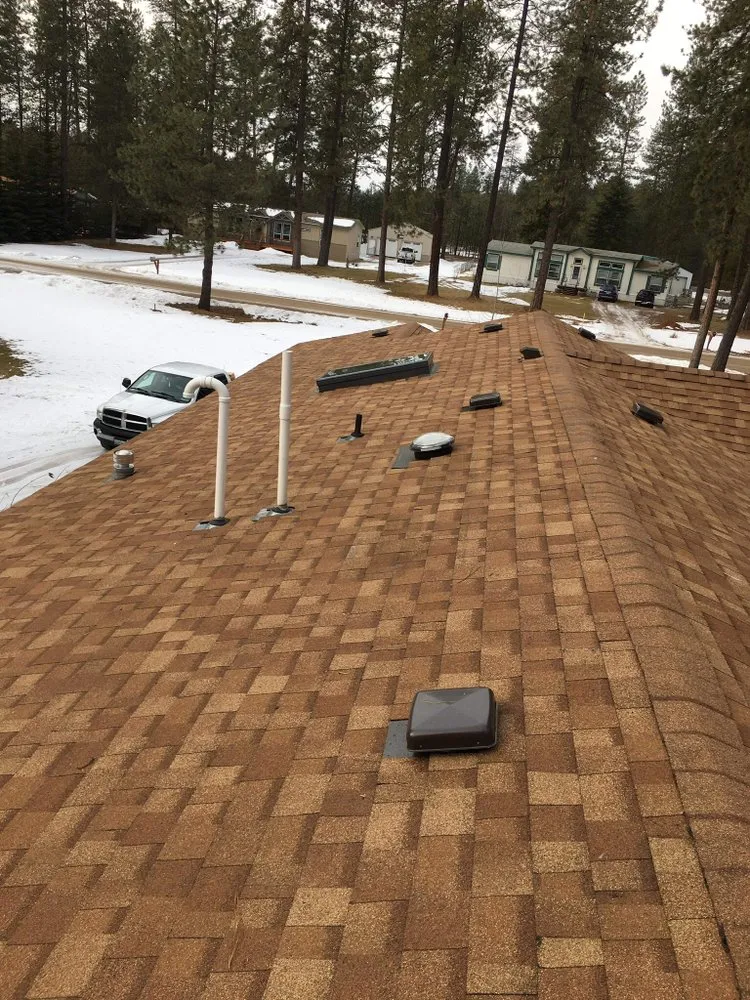 Slide of Norton Roofing