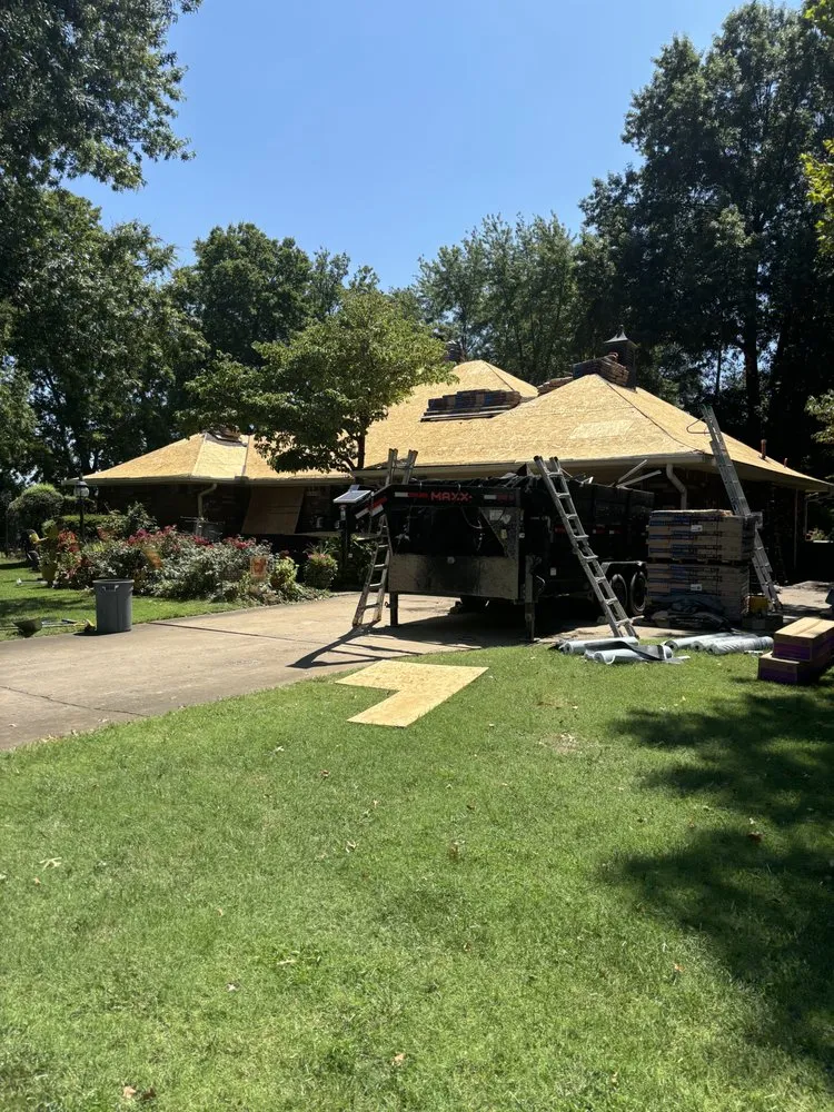 Slide of Nortons Roofing