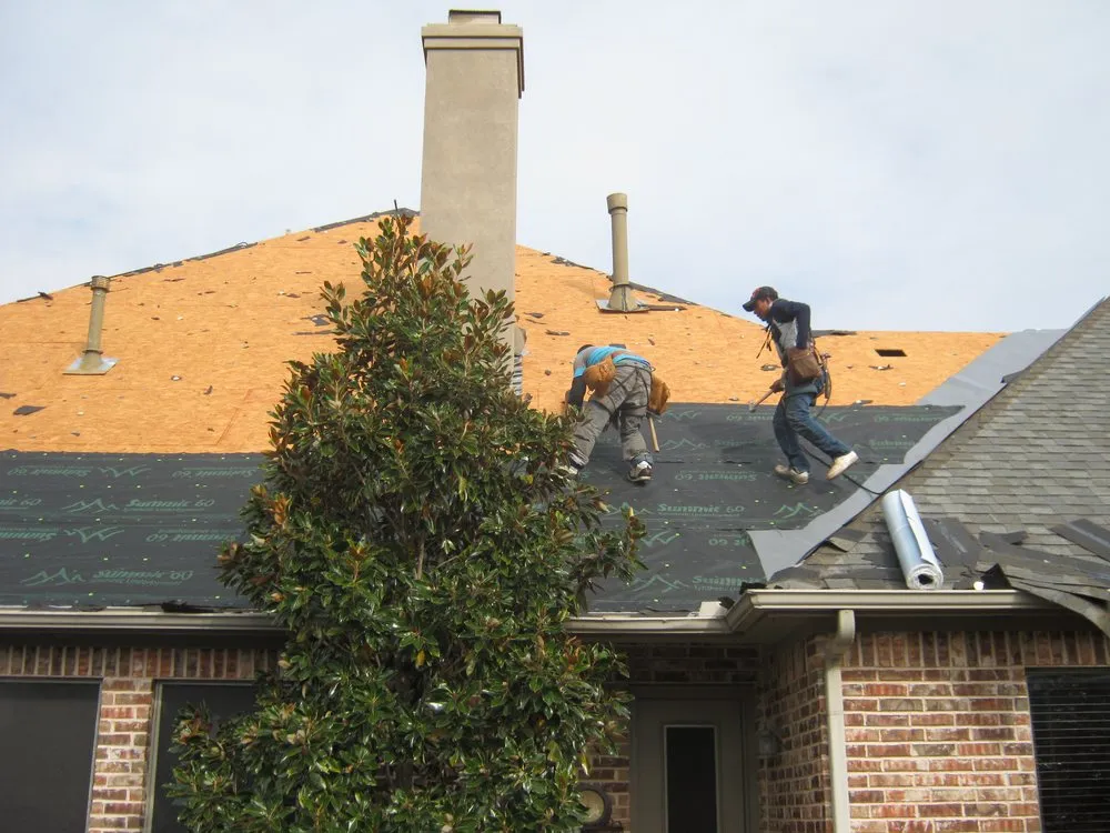 Slide of Norwood Roofing Systems