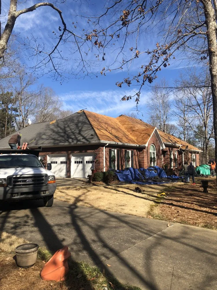 Slide of Noto Roofing