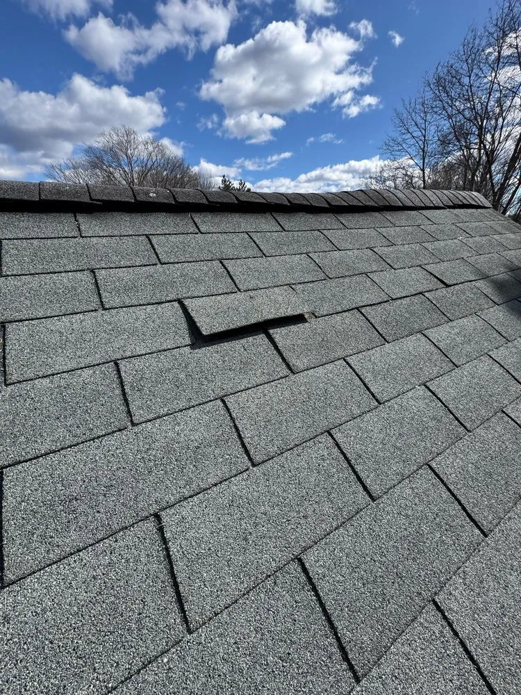 Slide of Np Roofing