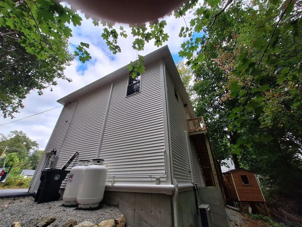 Slide of NRG Exteriors