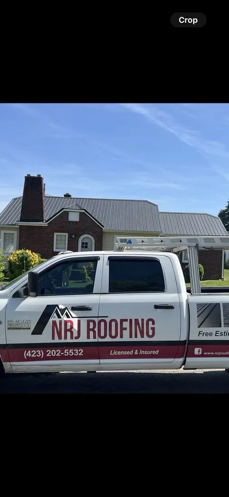 Slide of NRJ Roofing