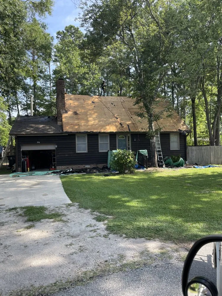 Slide of N&S Roofing