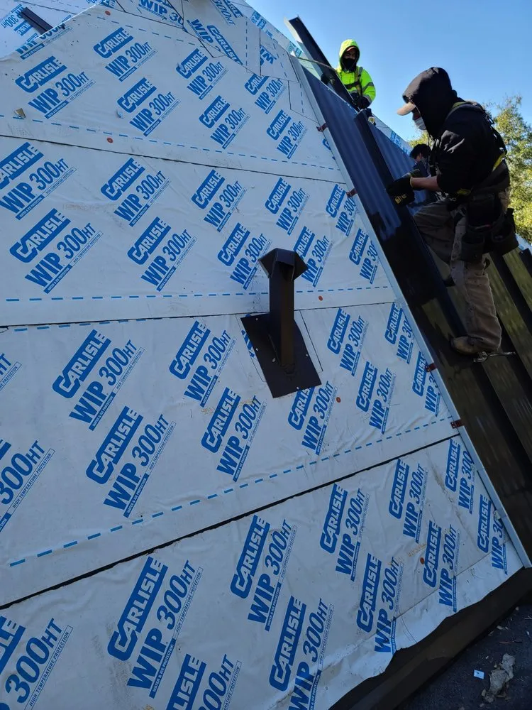 Slide of NSL Roofing Solutions