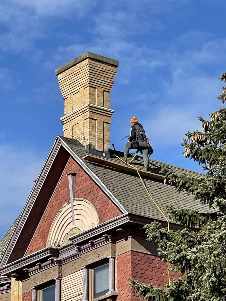 Slide of Nutmeg Roofing Company