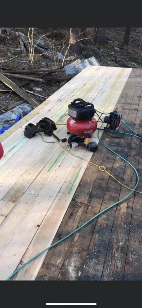 Slide of Nutmeg Roofing Company