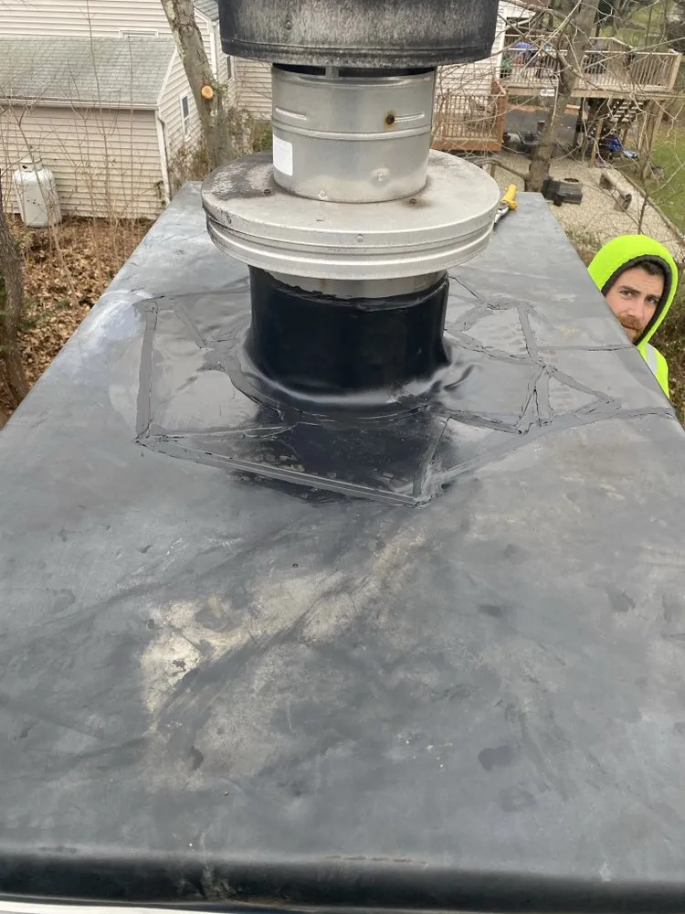 Slide of Nutmeg Roofing Company