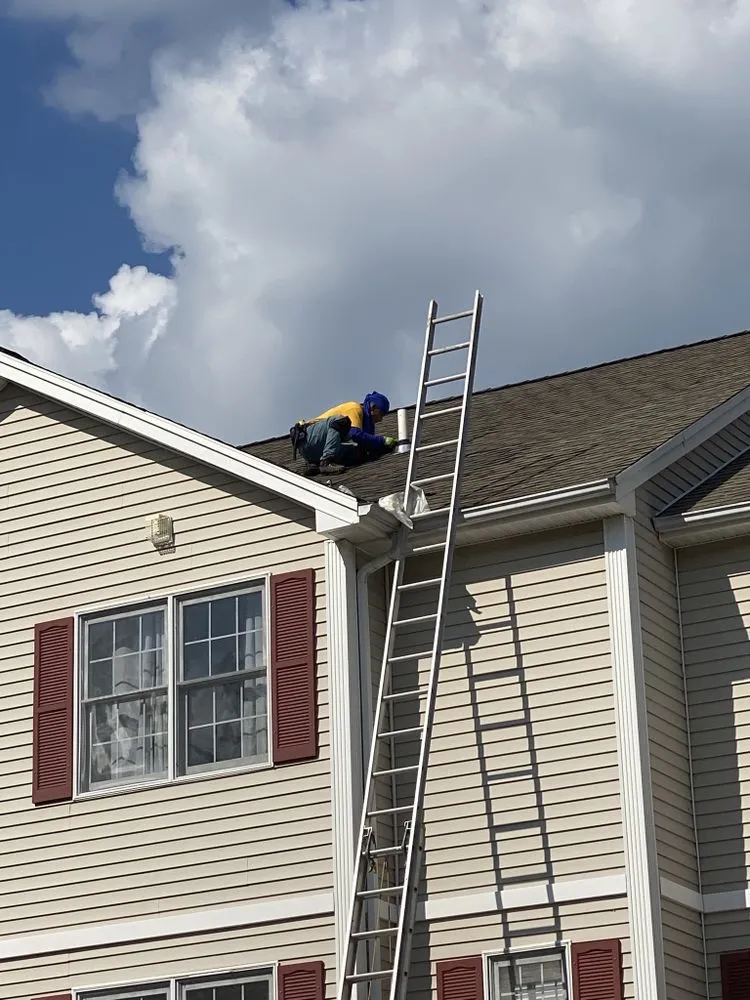 Slide of Nutmeg Roofing Company