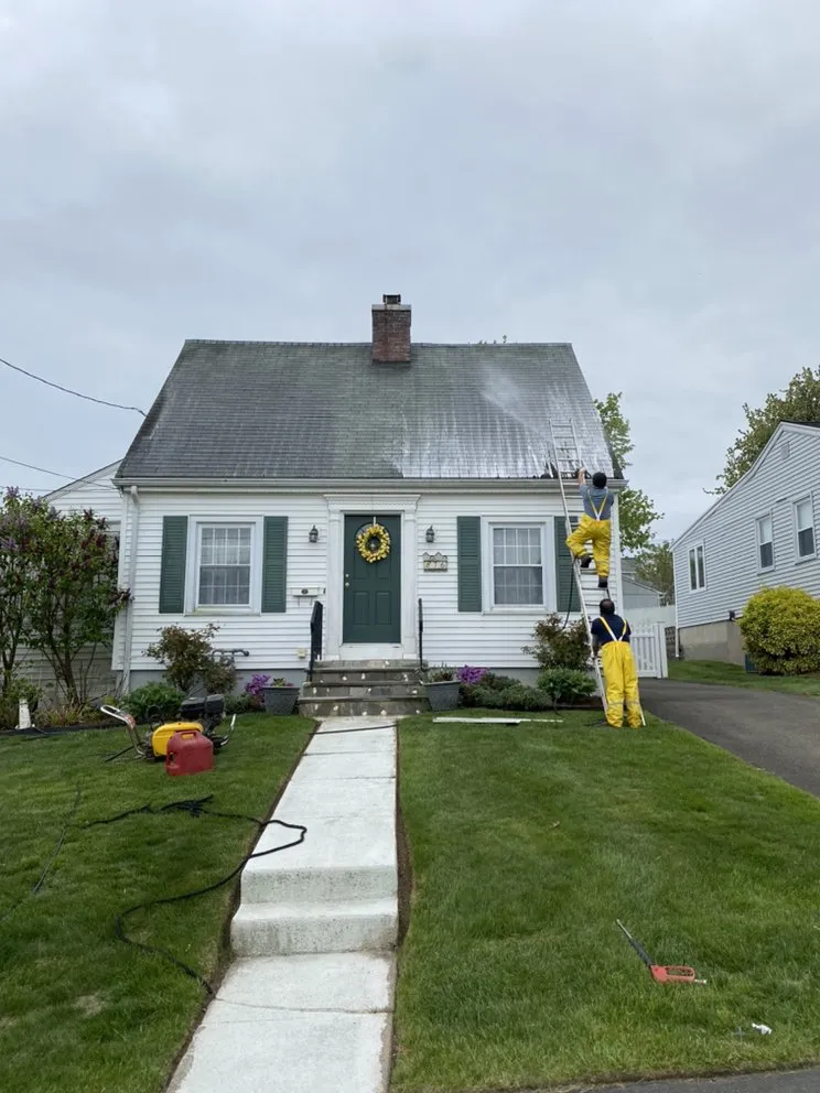 Slide of Nutmeg Roofing Company