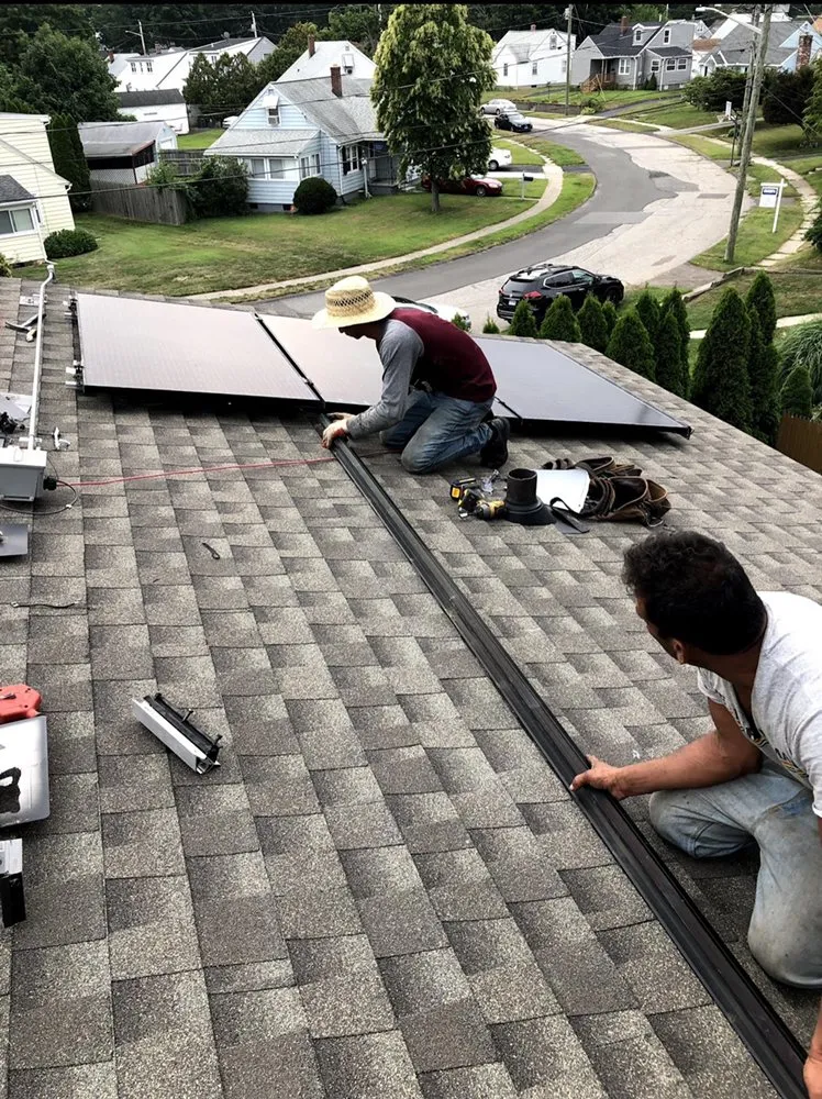 Slide of Nutmeg Roofing Company