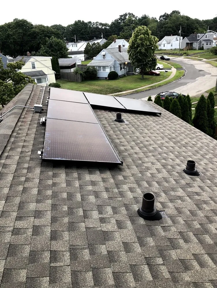 Slide of Nutmeg Roofing Company