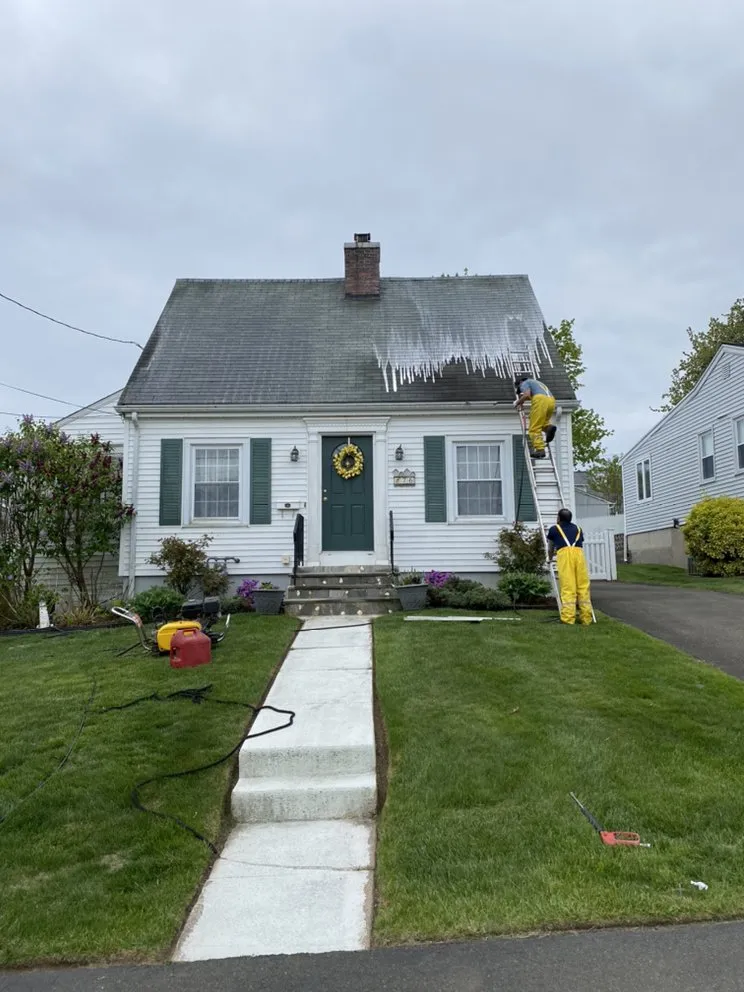Slide of Nutmeg Roofing Company