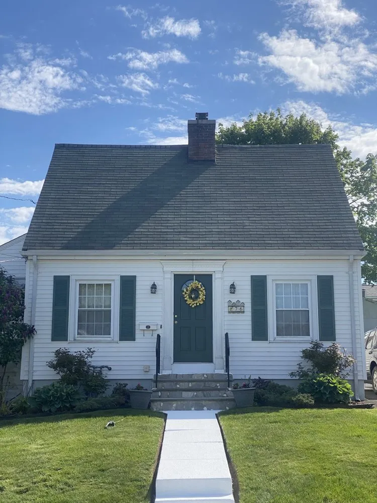Slide of Nutmeg Roofing Company