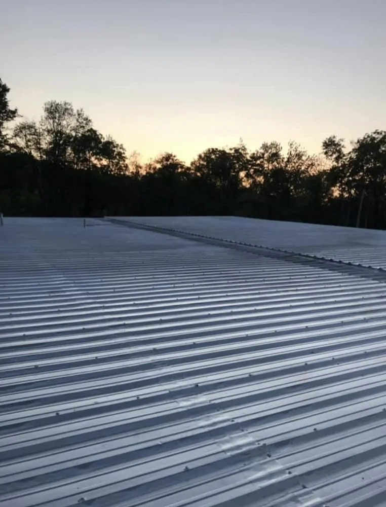 Slide of Nutmeg Roofing Company