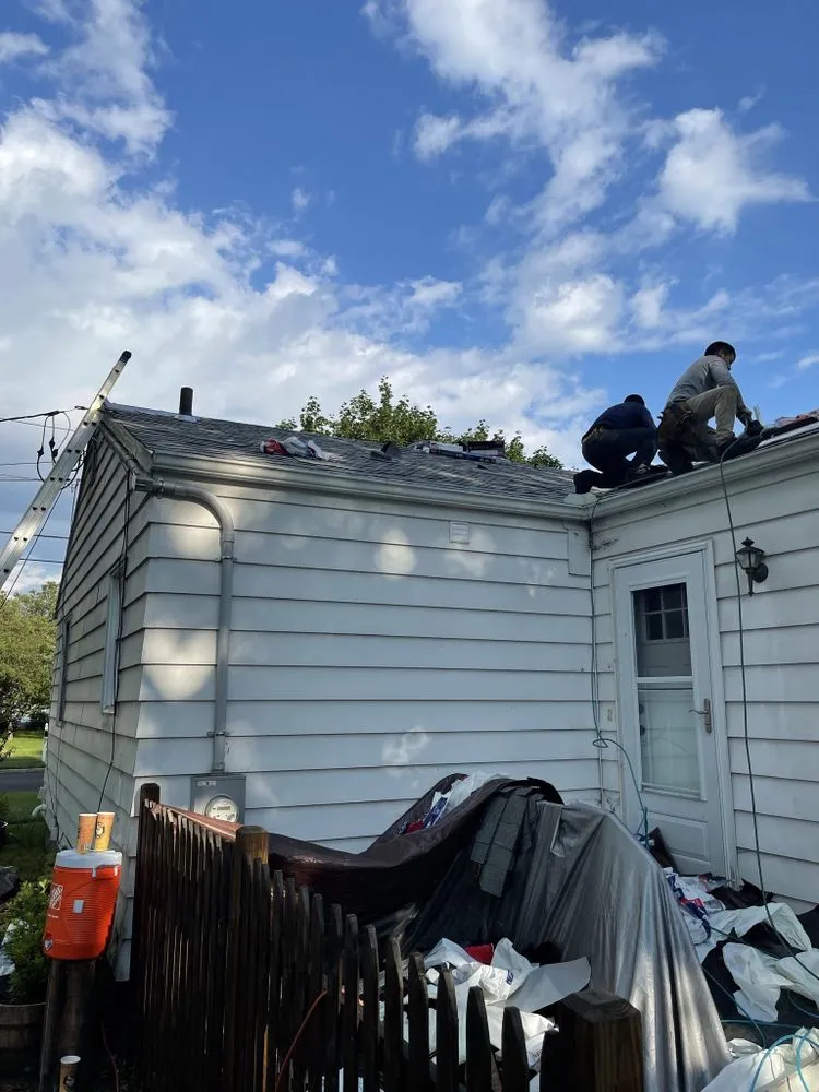 Slide of Nutmeg Roofing Company