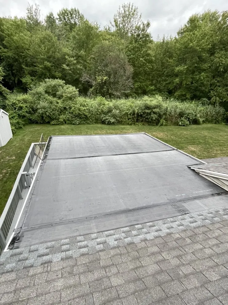 Slide of Nutmeg Roofing Company