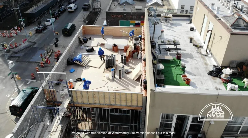 Slide of N.V Commercial Roofing