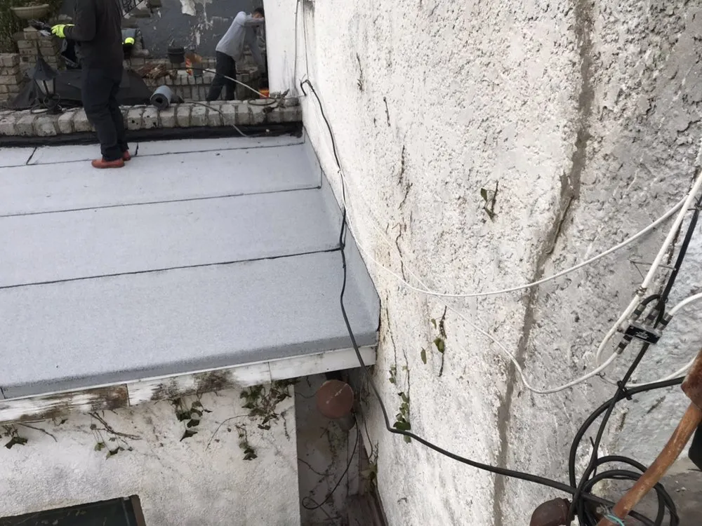 Slide of N.V. Roofing Services