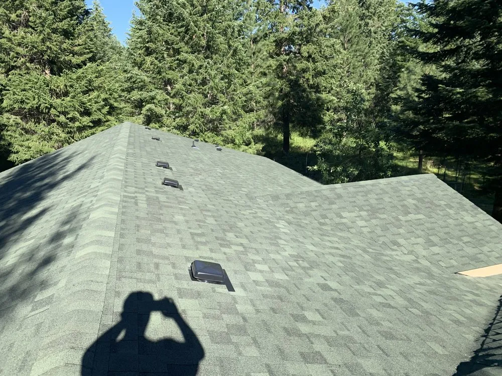 Slide of NW Peak Roofing