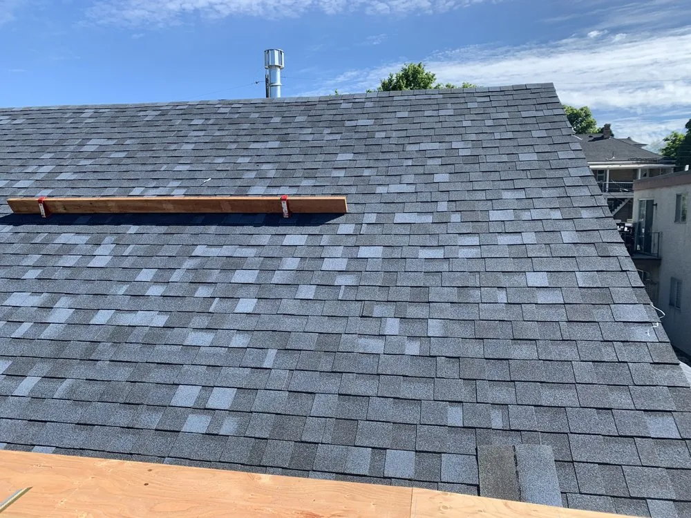 Slide of NW Peak Roofing