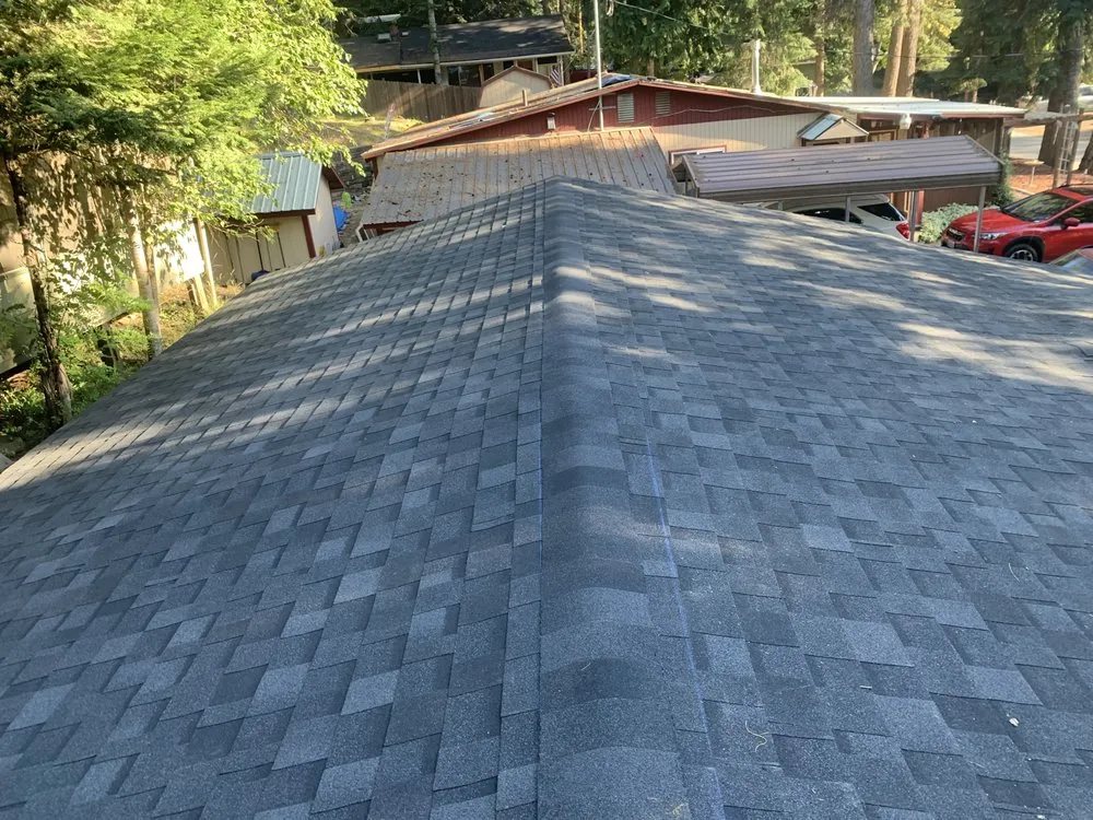 Slide of NW Peak Roofing